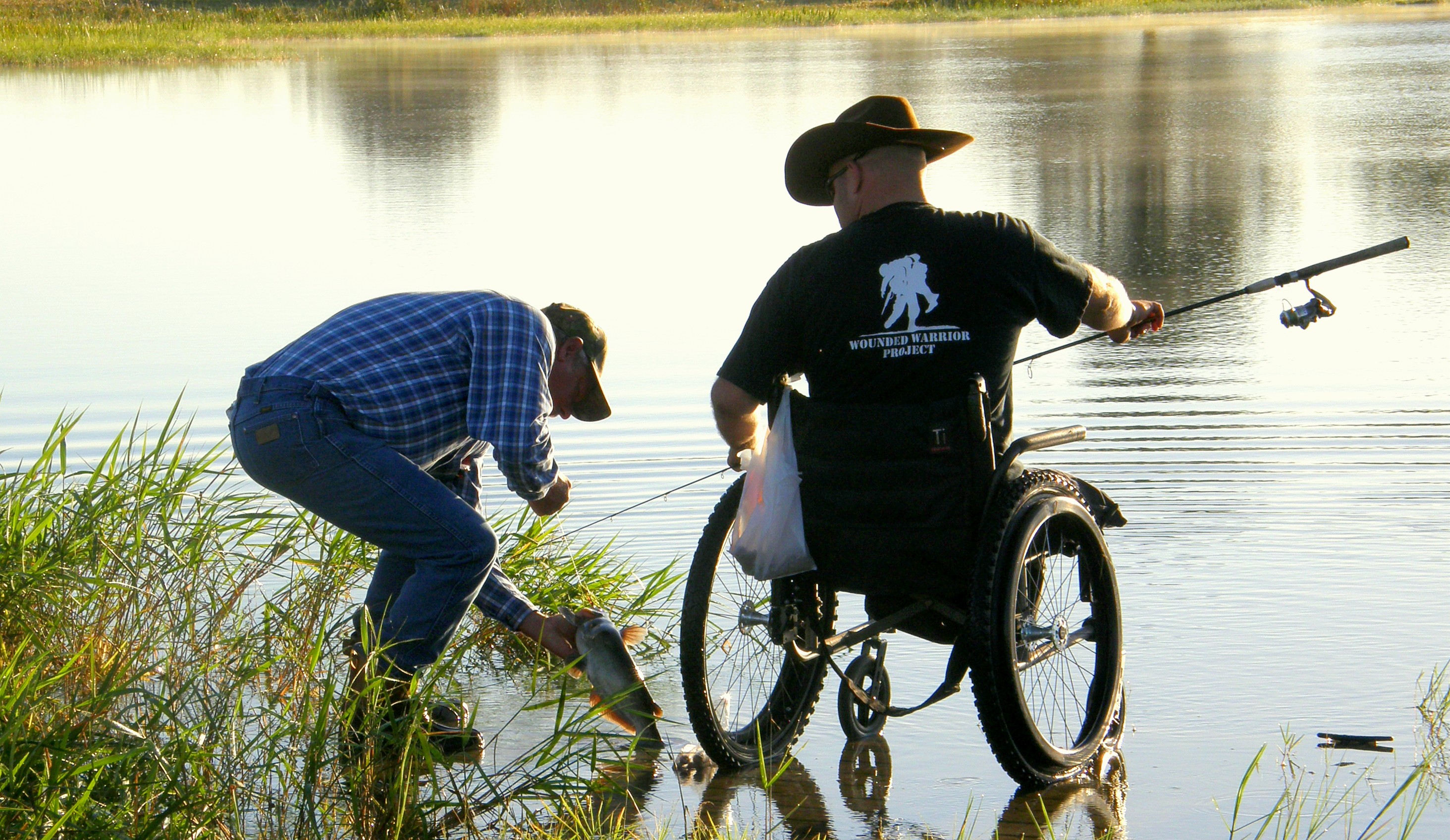 Wounded Warrior Project member fishing on a lake