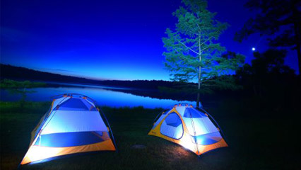 Two tents under the night sky