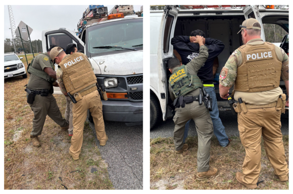 Two officers arresting a suspect