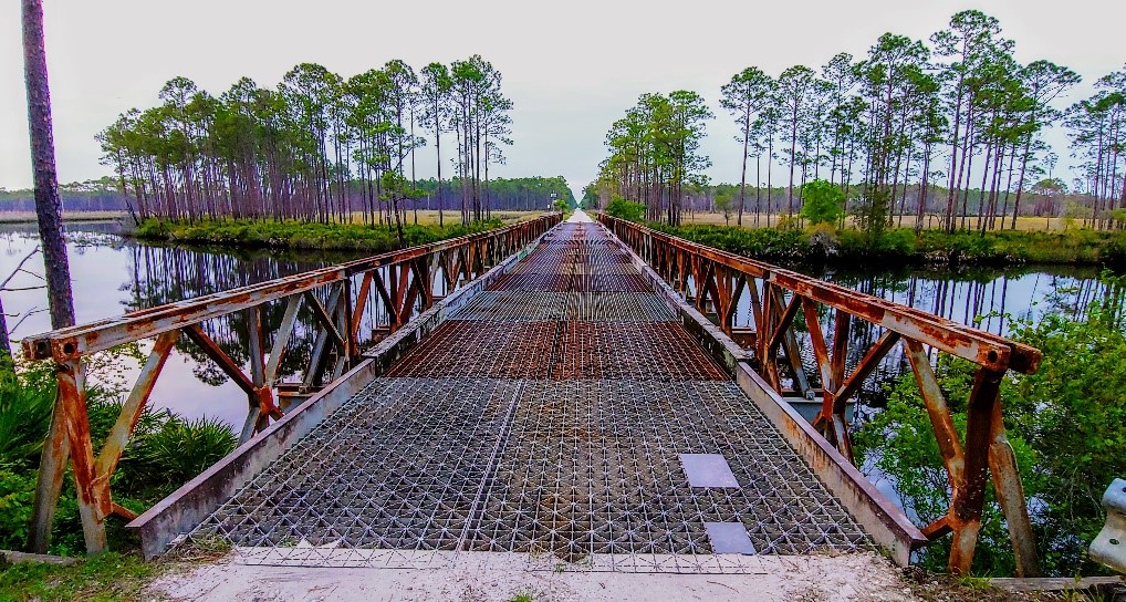 An iron bridge over a bay