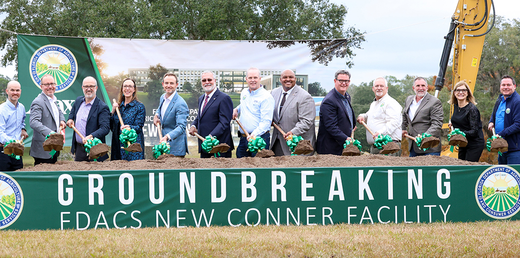 The Commissioner and other dignitaries holding shovels at the groundbreaking ceremony for the new Conner facility