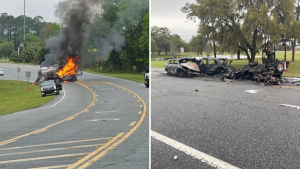 A fiery car crash on a road